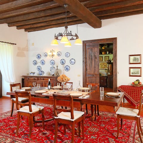 Organise a formal dinner in the antique-strewn dining room