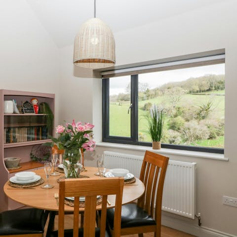 Take in the views over the Gloucestershire countryside from the dining table