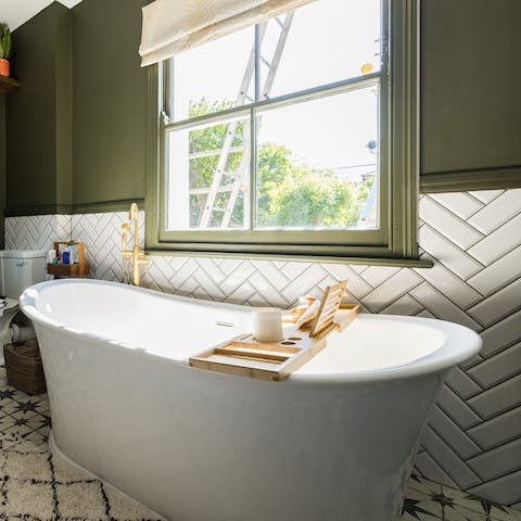 Have a reviving soak in the tub after a busy day sightseeing