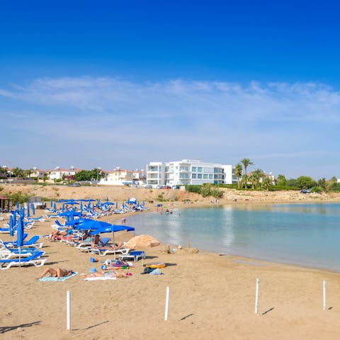 Explore Ayia Triada's sandy beach before venturing further afield to Protaras