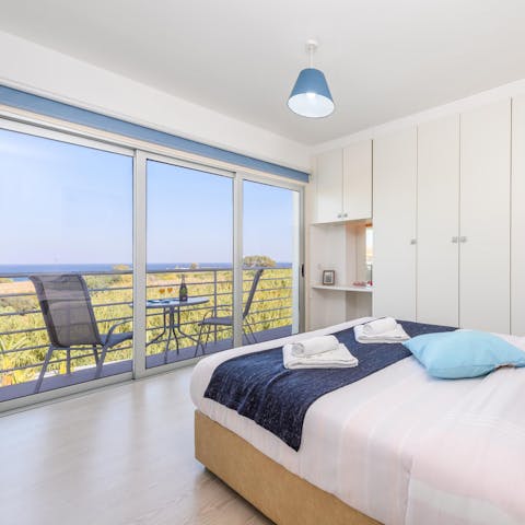 Wake up in the main suite and pad out to the balcony to enjoy your coffee in the fresh air