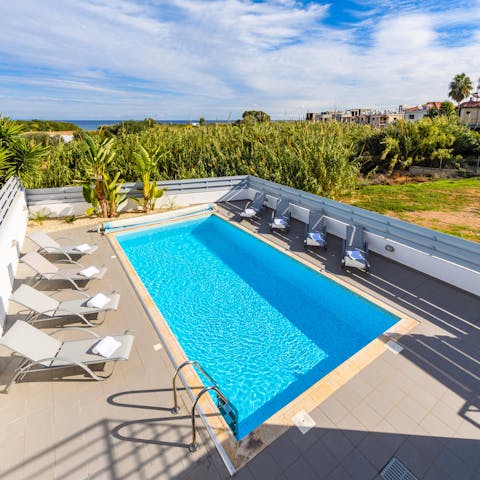 Take a dip in the private pool on blue-skied afternoons