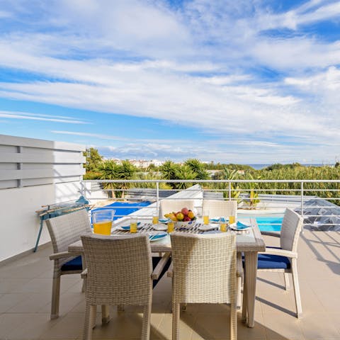 Tuck into a Cypriot feast on the terrace as the sun goes down