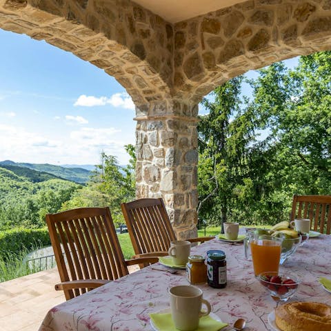 Dine alfresco in the picturesque, shaded setting