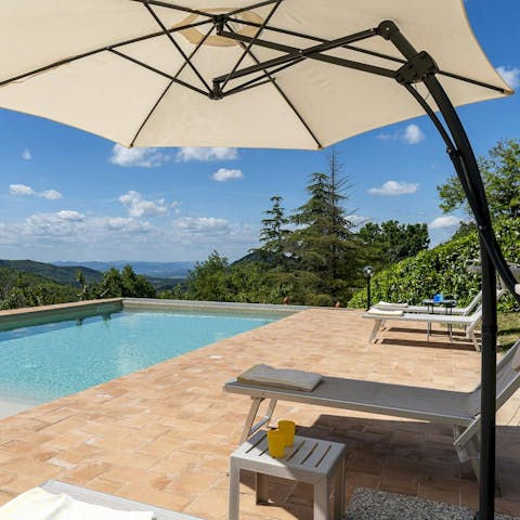 Go for a dip in the pool or lay back on the sun loungers