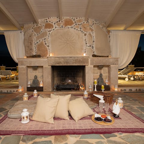 Feel the romance under the canopy with cushions and a picnic