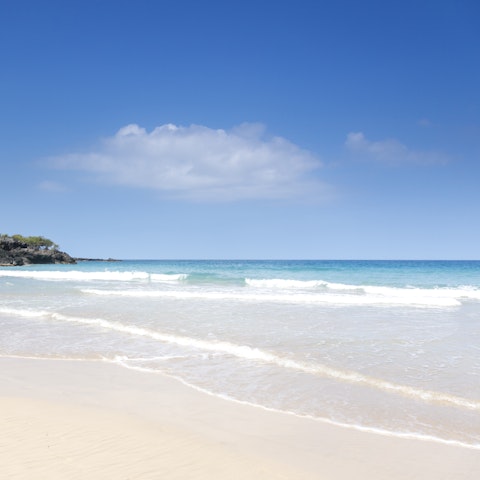 Stroll down to Waikōloa Beach and take a dip in the water