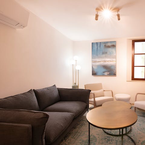 Kick back on the sofa with a plate of sweet macarons