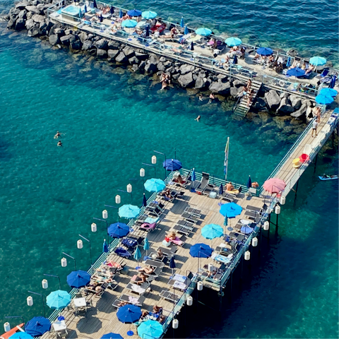 Spend the day soaking up the sun from Leonelli's beach, a short walk away