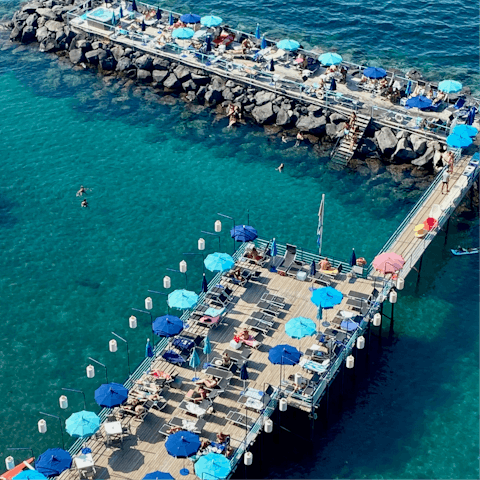 Spend the day soaking up the sun from Leonelli's beach, a short walk away