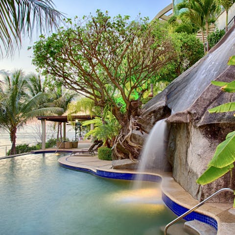 Toast the sunset from the infinity pool complete with a waterfall