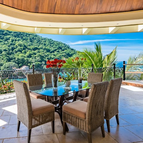 Enjoy alfresco meals on the terrace with sweeping ocean views