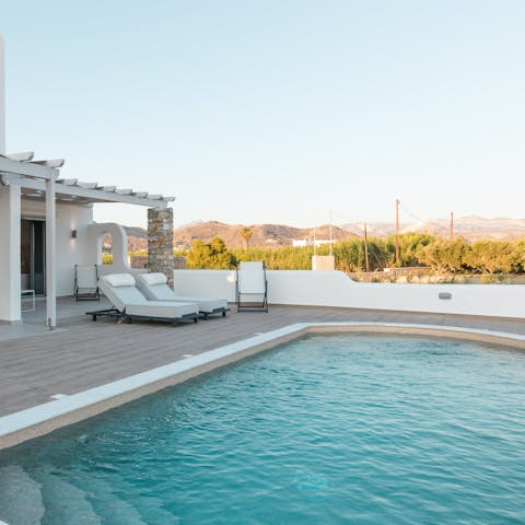 Cool down in the pool with stunning mountain views