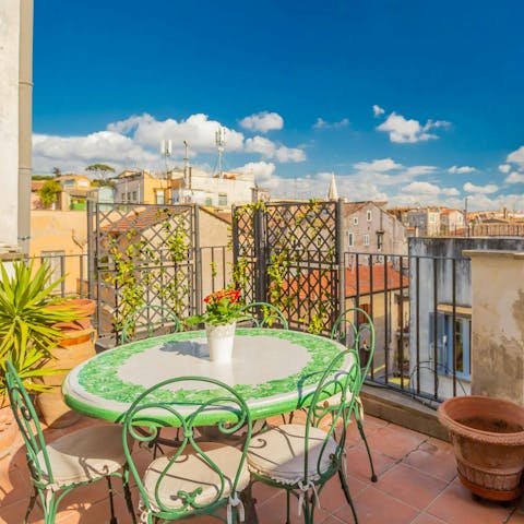 Savour meals on the rooftop balcony