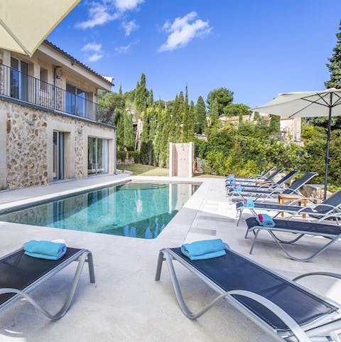 Enjoy cooling dips in the pool and lazy sunbathing sessions on a lounger
