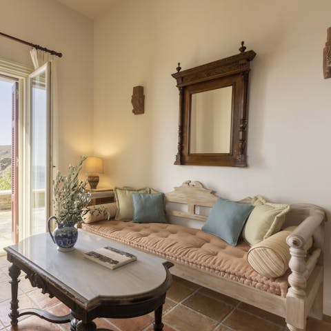 Steal a moment for yourself with your morning coffee in the elegant living space