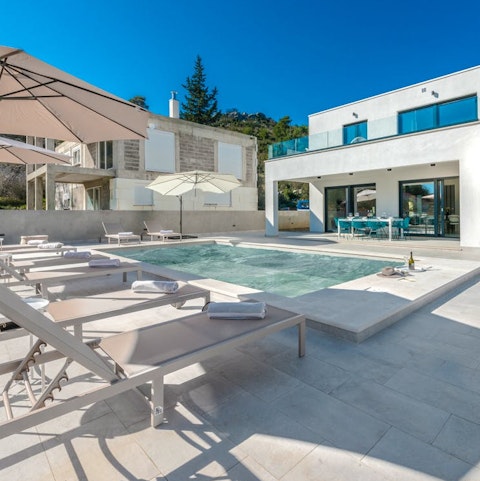 While away the hours on a lounger poolside