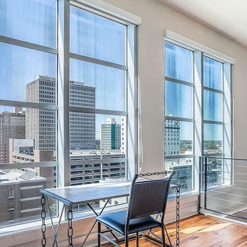 Catch up on work during your stay with a stunning cityscape before you