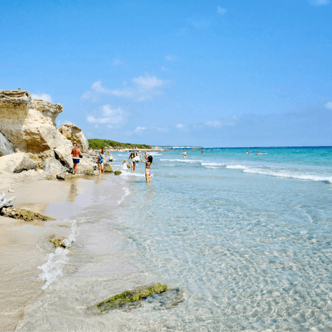 Drive to the nearby Ionian coast and sunbathe on Campomarino di Maruggio beach