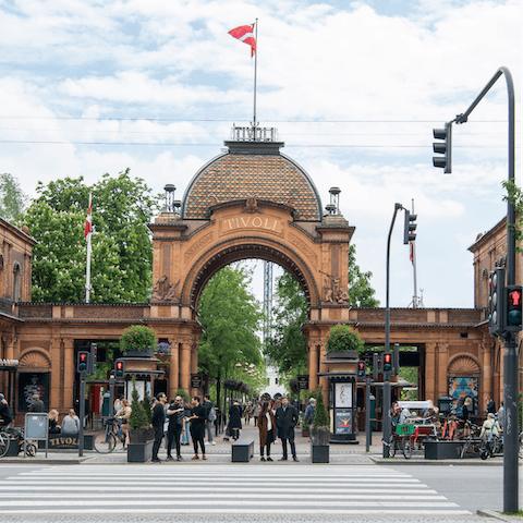 Ride the roller coaster at the nearby Tivoli Gardens