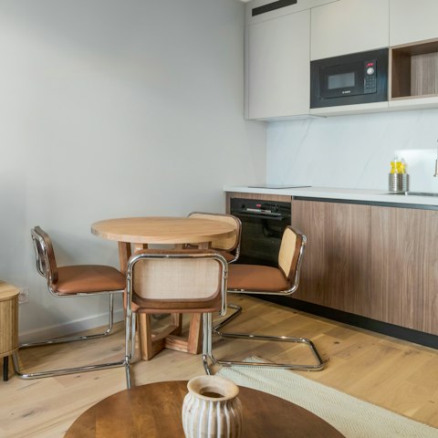 Enjoy fresh croissants at the intimate dining table