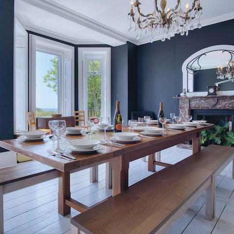Lay the table for a glamorous dinner party overlooking the sea
