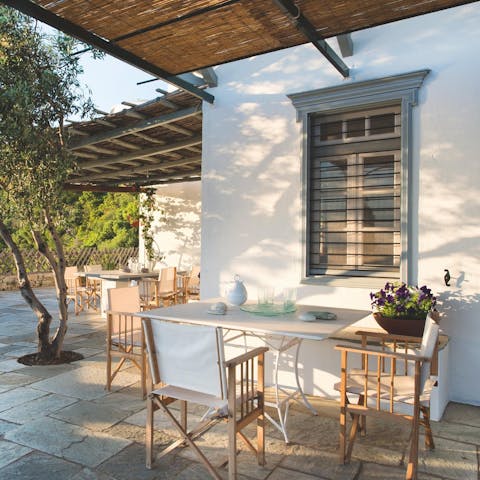 Dine alfresco on the cute outdoor table