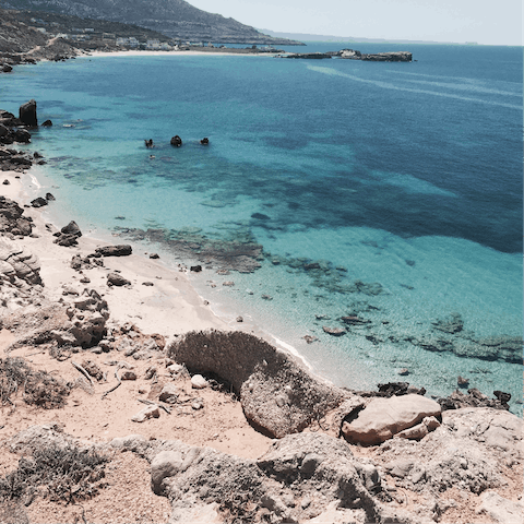 Walk down your private stairway to the beach