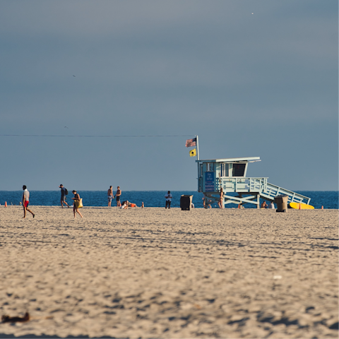 Be at the sandy beach within a 20-minute walk