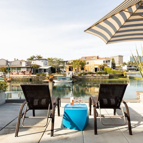 Sunbathe with harbour-side views
