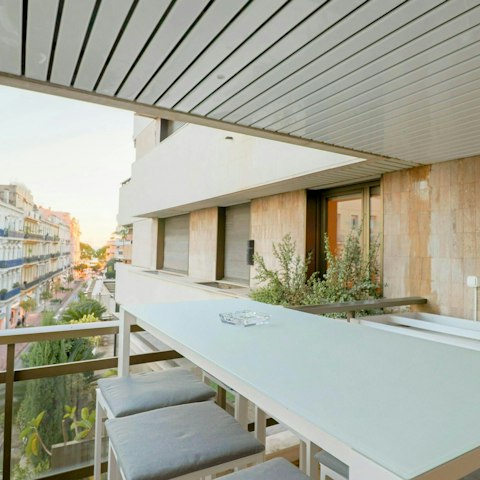 Enjoy an afternoon aperitivo on the private balcony