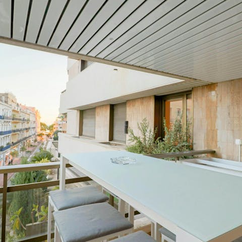 Enjoy an afternoon aperitivo on the private balcony