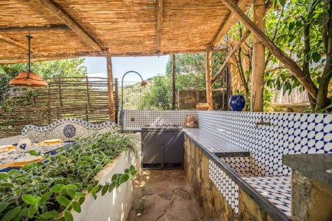 Prepare alfresco meals in the beautiful outdoor kitchen