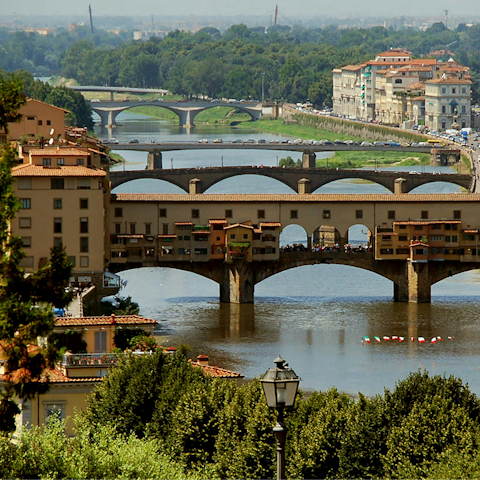 Cross over Florence's iconic Ponte Vecchio, just a short walk away