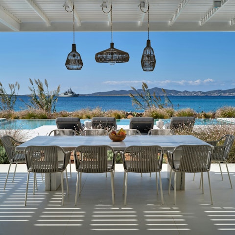 Tuck into tasty meals alfresco with sea views