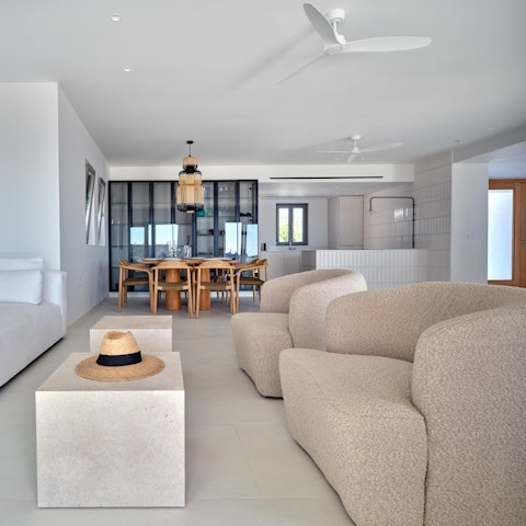 Take a break from the sun in the cool and contemporary living room