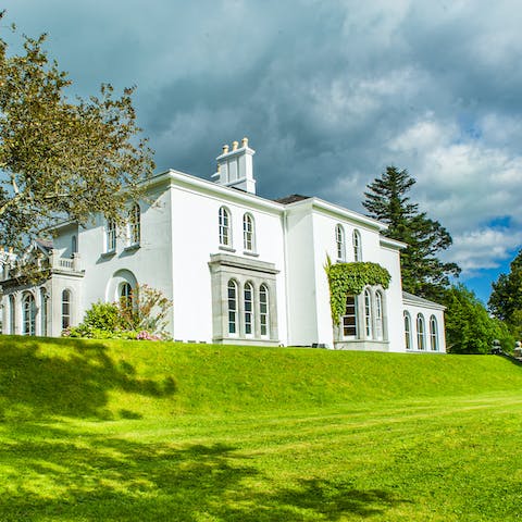 Find a peaceful spot out among the sixty-eight acres of private parkland around the home