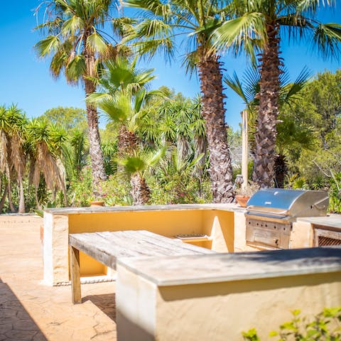 Fire up the barbecue for an alfresco meal of smoky seafood paella