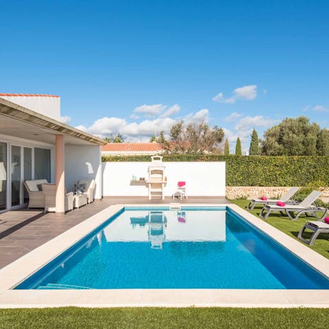 Make the most of the sunshine by moving between the sun loungers and pool