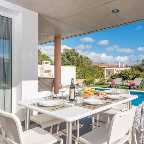 Enjoy a glass of wine with lunch as you dine alfresco