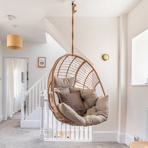 Hang out in the retro egg chair with a good book