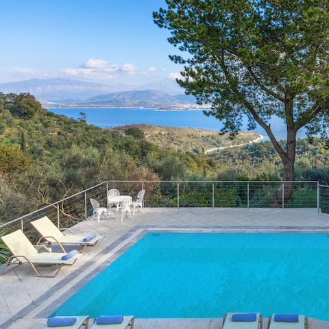 Spend warm afternoons relaxing on a lounger or swimming in the pool