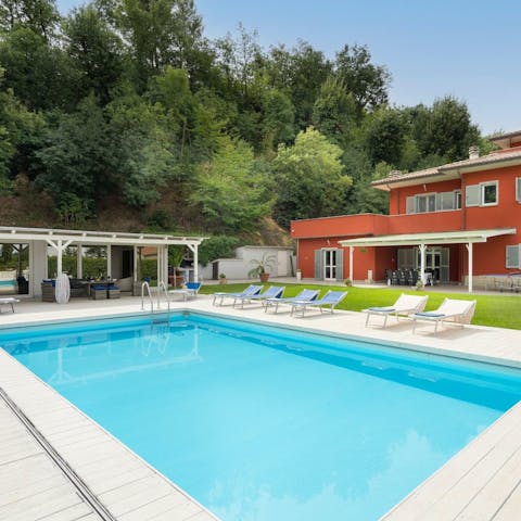 Spend your days drifting between the pool and a sun lounger