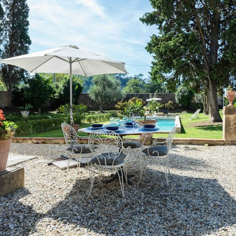 Dine outside in the beautiful landscaped gardens