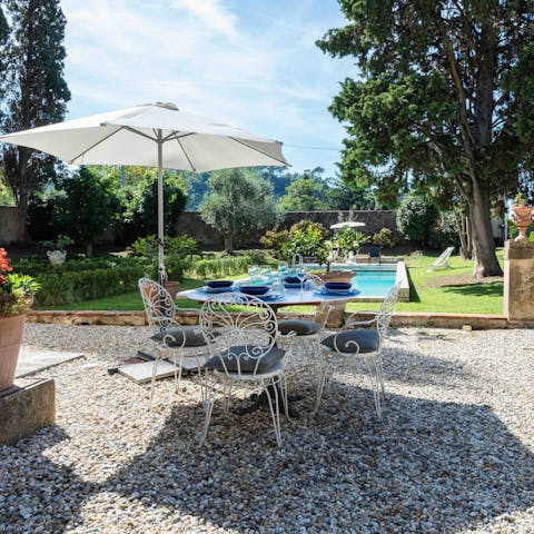 Dine outside in the beautiful landscaped gardens