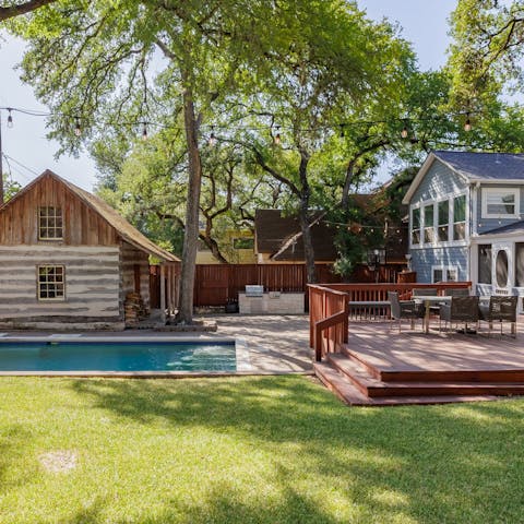 Spend an afternoon in the backyard, complete with pool, grill and mini golf
