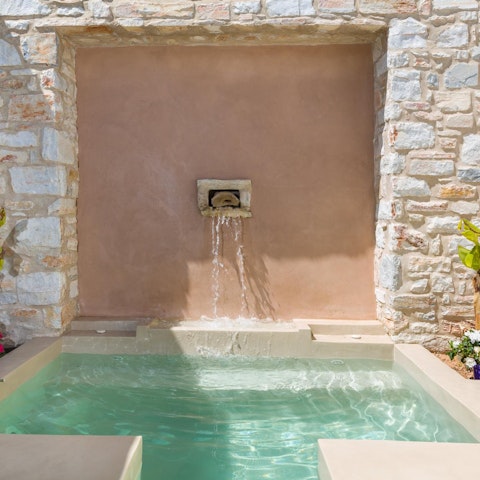 Relax in the outdoor jacuzzi after a day of exploring
