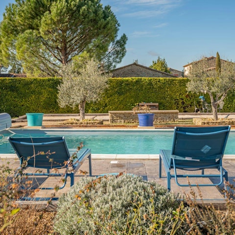 Relax in the French sun by the pool