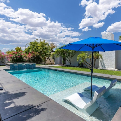 Relax in the private pool or the hot tub