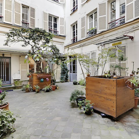 Return back home through a quiet courtyard